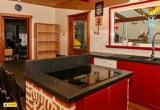 rustic-kitchen-with-red-cabinets